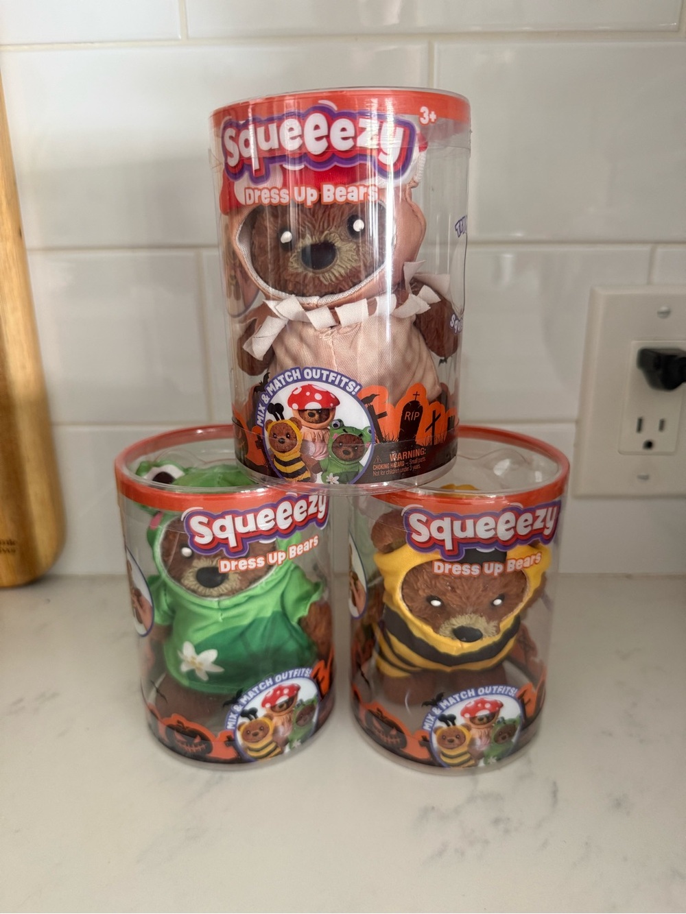 Squeezy Dress Up Bear - Assorted Costumes (Red, Green, Yellow)